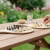 Raquettes de plage en bois transformées en plateaux de jeux échecs et ludo, utilisées en extérieur