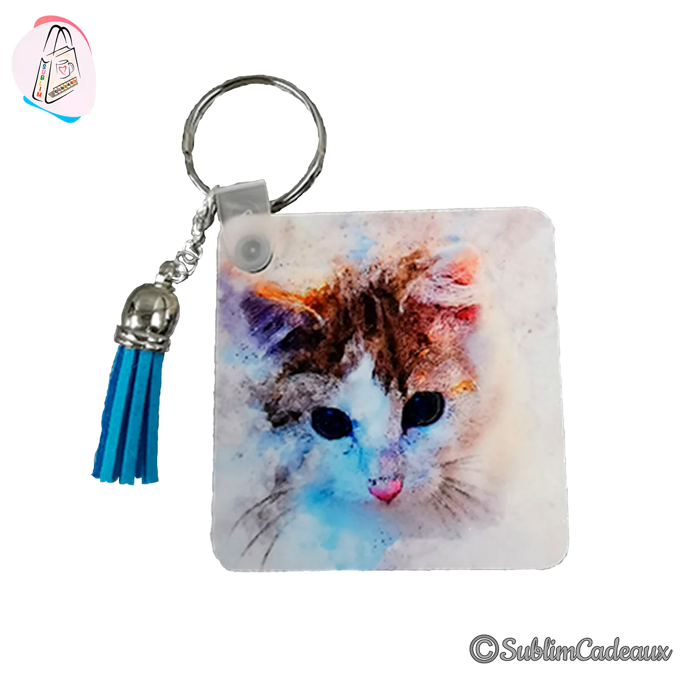 Porte-clés carré imprimé d'un chaton en aquarelle aux tons bleu et orange, avec pompon bleu