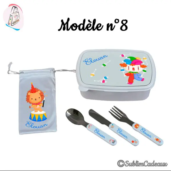 Coffret repas enfant : boîte, pochette et couverts imprimés d'un clown jongleur et d'un lion de cirque, couleurs vives