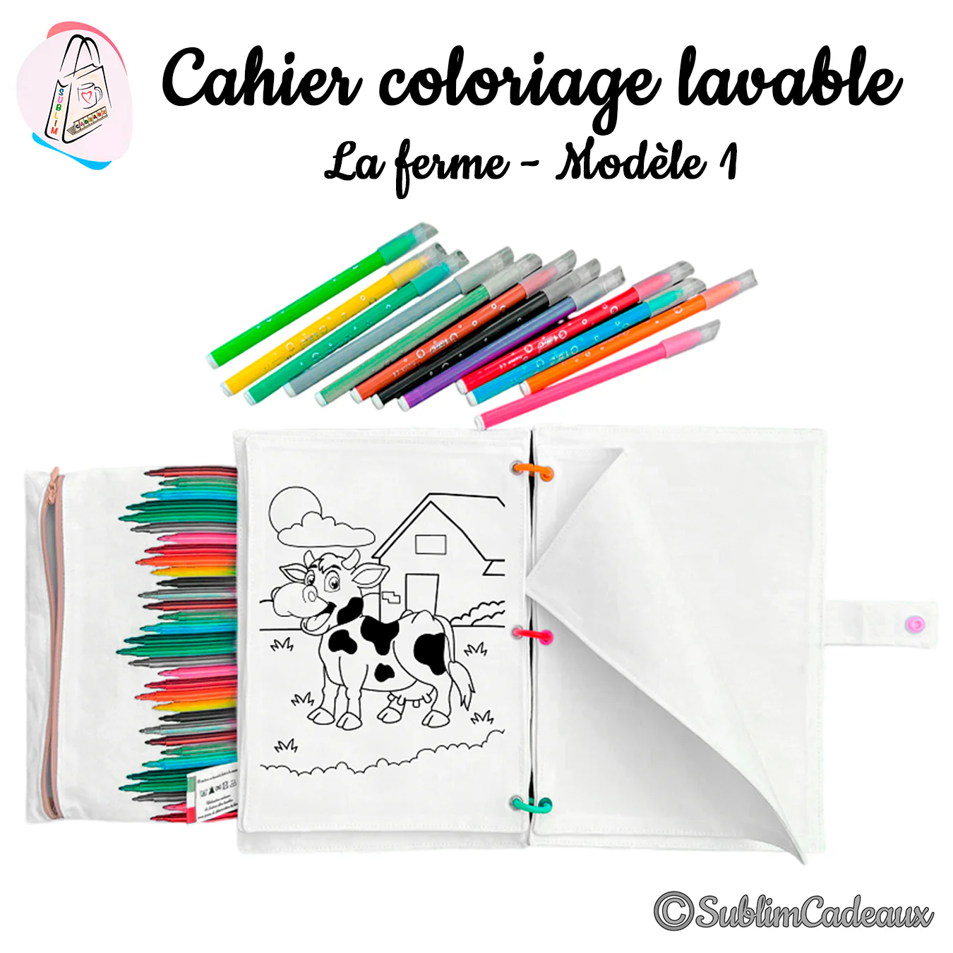 Cahier de coloriage lavable en tissu ouvert sur un dessin de vache et de ferme à colorier, avec feutres et trousse